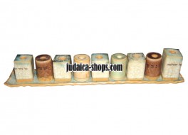 A unique ceramic Menorah of cylinders and cuboids. (Hanukiah)